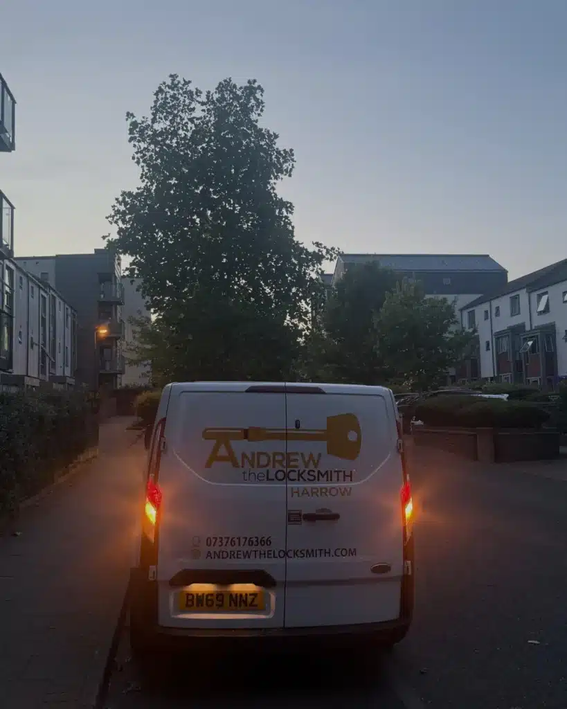Andrew the Locksmith's branded van at dusk with lights on, out on an emergency call-out in Harrow
