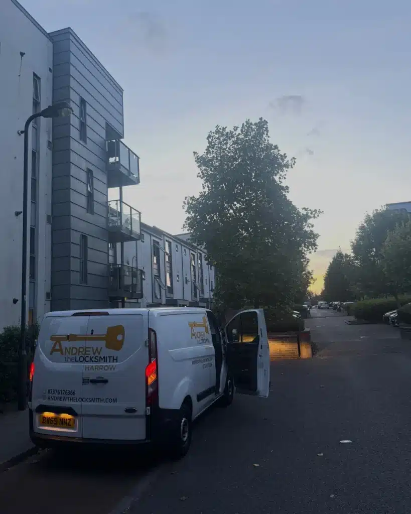 Andrew the Locksmith's van parked at dusk with the door open, arriving on an emergency call-out in Harrow