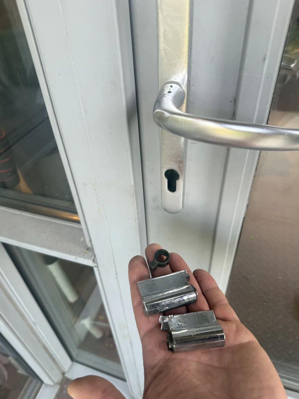 A basic euro cylinder snapped clean in two by lock snapping, in Harrow
